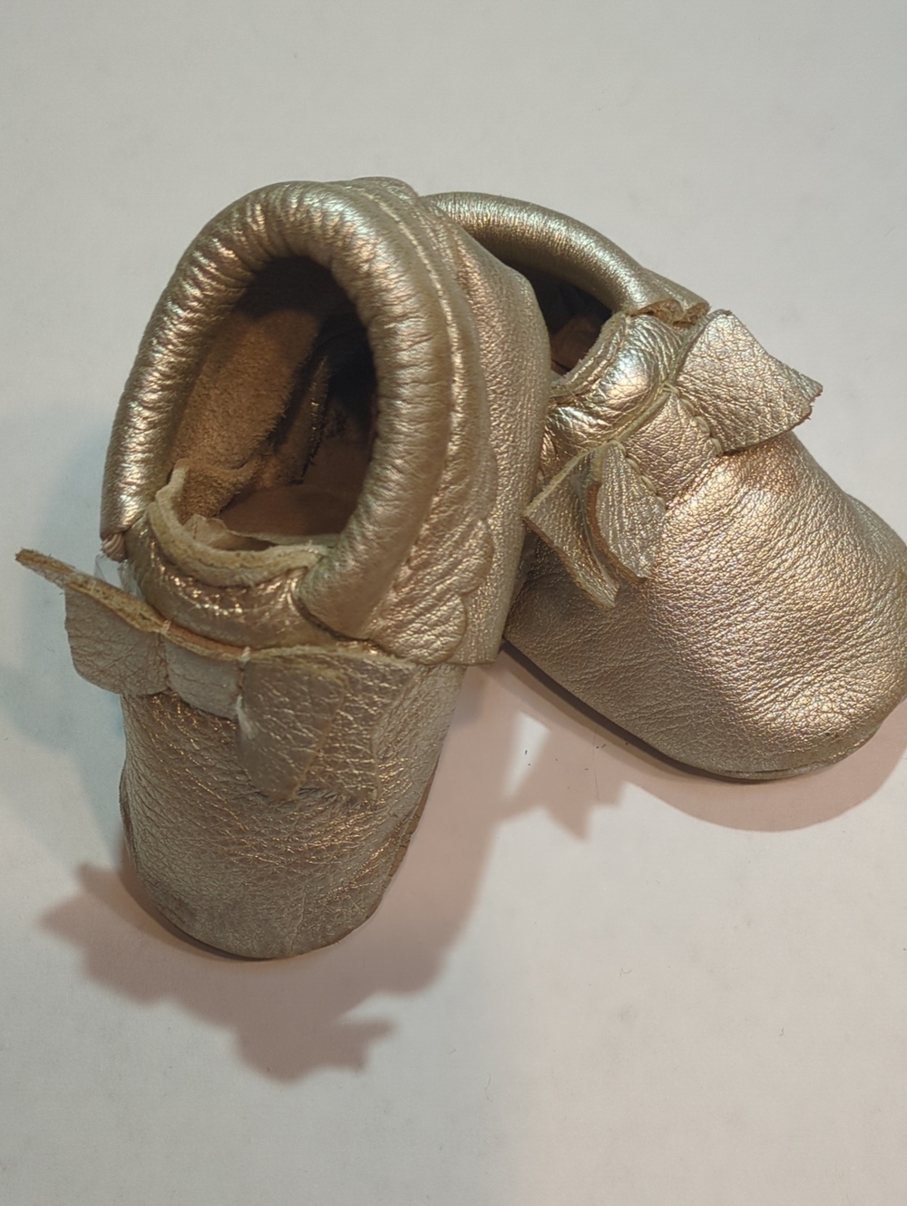 Freshly Picked Metallic Gold Baby Bow Moccasins
